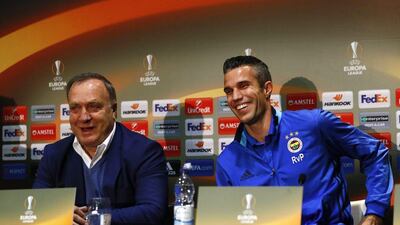 Fenerbahce manager Dick Advocaat, left, and Robin van Persie during a press conference ahead of the Europa League clash with Manchester United. Jason Cairnduff / Reuters