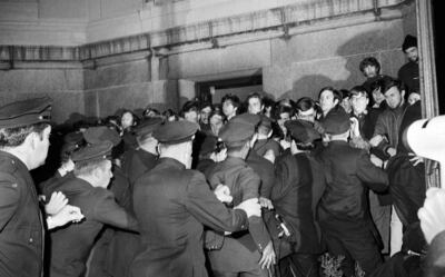 New York City police rush toward student protesters in the early morning, April 30, 1968, outside Columbia University's Low Memorial Library as they sought to remove demonstrators involved in sit-ins at university buildings. AP