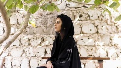 Abaya designer Alia bin Omair has witnessed the changing fabrics and colours used to create abayas. Reem Mohammed / The National