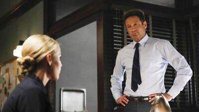 Claire Holt, left, as Charmain Tully, and David Duchovny as Sam Hodiak in Aquarius. Vivian Zink / NBC / NBCU Photo Bank via Getty Images