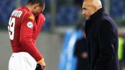 Luciano Spalletti, right, and his players have been hanging their heads in shame at their training camp this week.