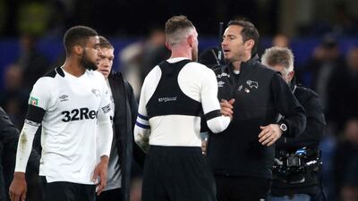 Frank Lampard shakes hands with Richard Keogh after the game. AP Photo
