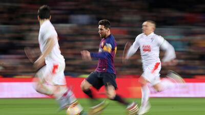 Barcelona's Lionel Messi runs at the Eibar defence. Reuters