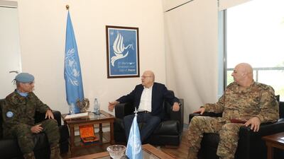 From left, Maj Gen Aroldo Lazaro, Unifil commander, Lebanese caretaker Prime Minister Najib Mikati and Lebanese Army commander Joseph Aoun in Naquora discussing the Israel-Gaza situation. AFP
