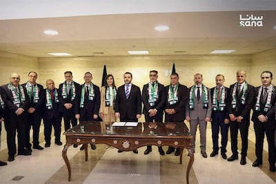 Syria's Foreign Minister Asaad Al Shibani welcomes the group of returning diplomats back to Damascus. Photo: Sana