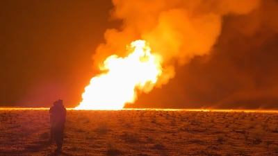 A gas pipeline on fire between the town of Al Shoula, in the south of Syria's Deir Ezzor province, and the provincial capital. Sana