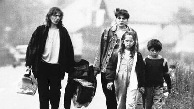 Yugoslavian sisters and their children flee Donji Miholjac in Croatia in 1991 during the war for independence that provides the backdrop to Sara Novic’s first novel. Laurent Rebours / AP Photo