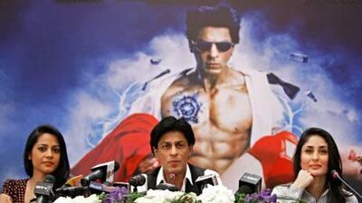 :Stars of the Bollywood movie Ra. One, from left, Shahana Goswami, Shah Rukh Khan and Kareena Kapoor at a press conference in Dubai before the world premiere of the movie at the Grand Cineplex yesterday.