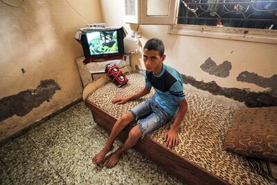 Montaser Bakr, the only survivor of the Bakr children involved in the beach attack, in his Gaza City home. Majed Mahmoud for The National