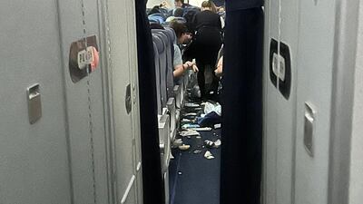 Food and other objects strewn on the floor after Flight 469, from Austin, Texas, to Frankfurt, hit heavy turbulence
