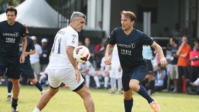 Gaizka Mendieta of Team Laureus and Marcelo of Team YR1M battle for the ball during the Laureus All Stars Unity Cup. Ian Walton / Getty Images / March 25, 2014