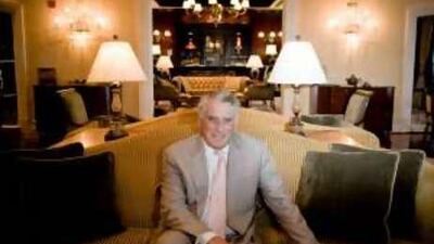 The lounge of the Ritz-Carlton in Dubai frames Simon Cooper, president and chief operating officer of the company.