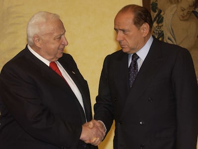 Ariel Sharon, left, and Silvio Berlusconi signed a defence agreement in 2003. Getty Images