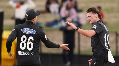 New Zealand's Nathan Smith, right, after taking the wicket of Pakistan’s Tayyab Tahir. AFP