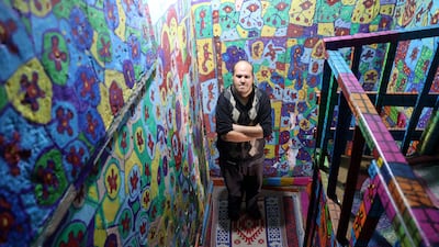 He then painted the inside of the house, including the stairwell.