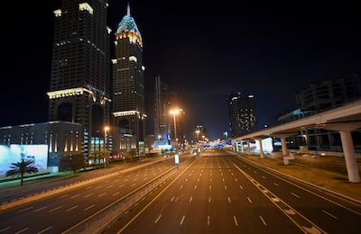 The usually jam-packed Sheikh Zayed Road in Dubai wears a deserted look. AFP