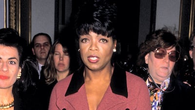 Oprah Winfrey wears a dusty pink two-piece suit to attend the 'One Smart Lady' Ladies Home Journal Awards on November 11, 1994. Getty Images