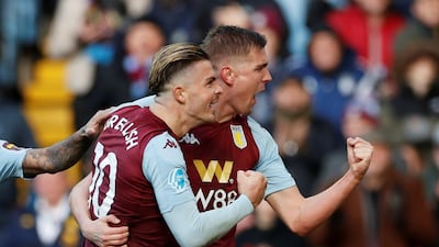 Bjorn Engels celebrates scoring their second goal with Jack Grealish. Reuters