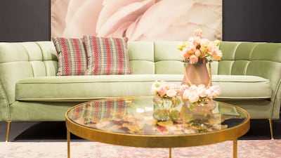 Use a piece of art as a focal point, and pick bold hues and different textures to create a room that pops. Courtesy aura