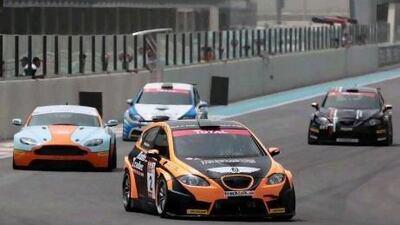 Nader Zuhour, in the orange-and-black SEAT, extended the title chase in Class 1 Total UAE Touring Cars by winning both races at the Yas Marina Circuit.