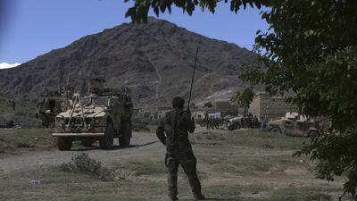 US forces and Afghan commandos are seen in Asad Khil village near the site of a US bombing in the Achin district, east of Kabul, Afghanistan, Saturday, April 17, 2017. AP Photo / Rahmat Gul