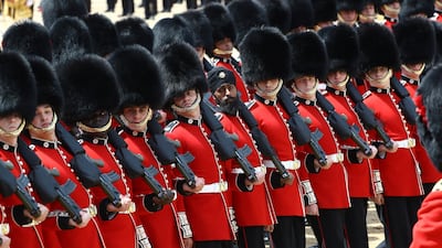 Coldstream Guards, including Guardsman Charanpreet Singh Lall, aged 22, a Sikh from Leicester who is the first soldier to wear a turban during the Trooping the Colour parade, march down The Mall as part of Trooping the Colour in central London, Britain. REUTERS / Simon Dawson