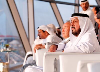 Sheikh Khalifa, Sheikh Humaid bin Rashid Al Nuaimi, Ruler of Ajman, and Nursultan Nazarbayev, President of Kazakhstan, watch the Formula One race at Yas Marina Circuit. Ryan Carter / The National