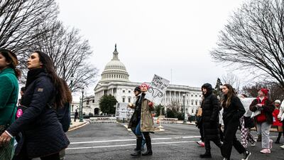 Demonstrators rally outside the US Capitol building in Washington. Bloomberg