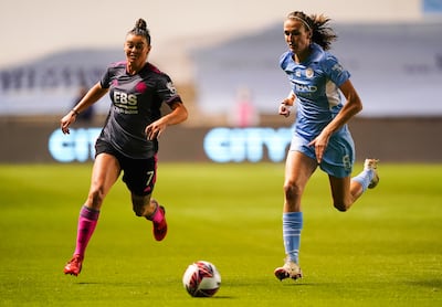 Manchester City's Jill Scott, right, and Leicester City's Natasha Flint battle for the ball during the Women's FA Cup quarter-final at Academy Stadium, Manchester on September 29, 2021. PA