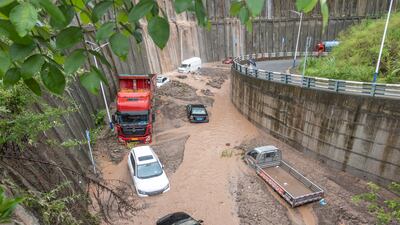 Submerged vehicles in Wanzhou district, south-west China. EPA