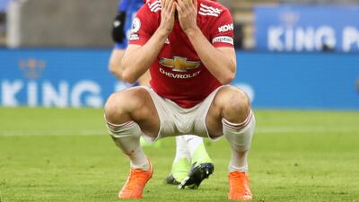 Manchester United's Harry Maguire reacts after missing a chance. Reuters