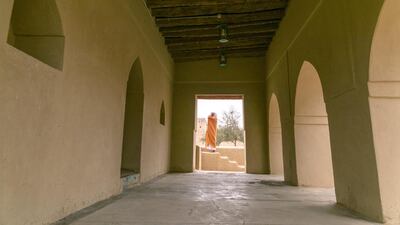 The historic building has been constructed with earth blocks and palm log beams.
