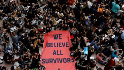 Activists rally inside the Senate Hart Office Building. Kevin Lamarque / Reuters