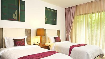 The decor at the Navalai River Resort is bright and each room is decorated with original art.