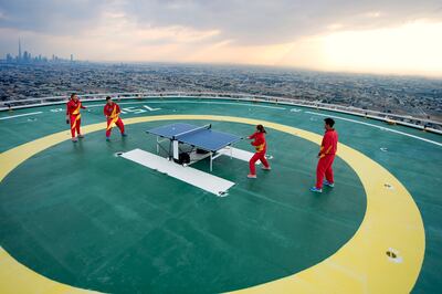 Chinese world number one table tennis players Long Ma and ShiWen Liu play on the Burj Al Arab helipad. Photo: Jumeirah