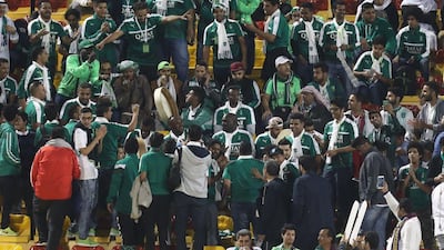 Supporters get ready for the match. Karim Jaafar / AFP
