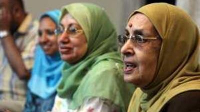 Reacting to the Obama speech on television in Cairo are, from right, Amina Abdou Bayoumi, Somaya Abdel Fattah and Mona Hussein.