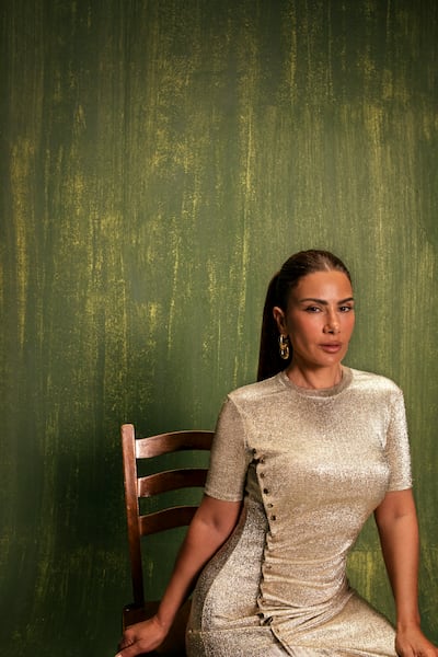 Pression dress in Lurex, Dh4,200; and Double XL Link earrings, Dh1,850, both by Rabanne