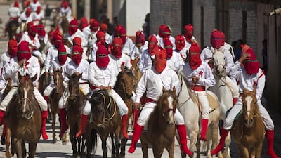 People take part in the ceremony of The Spies during the Holy Thursday celerbrations in Tzintzuntzan, Mexico. Luis Enrique / EPA