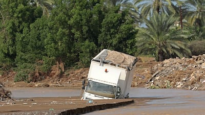 A vehicle is trapped by floodwater after the tropical Cyclone Shaheen in Al Khaburah city in Al Batinah on October 4, 2021. AFP