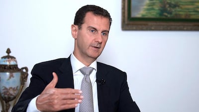 Syrian president Bashar Al Assad speaking during an interview in Damascus. SANA / AFP
