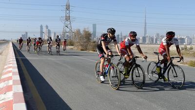 Riders practise for the Dubai Tour at the cycle track in Nad Al Sheba in Dubai. Pawan Singh / The National
