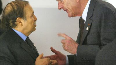 Jacques Chirac speaks to Algerian President Abdelaziz Bouteflika in the 22nd African Heads of State Conference on February 21, 2003 in Paris. Getty Images
