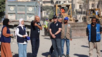 A UN Development Programme delegation, including special representative Jaco Cilliers, centre, assess the damage in Gaza city after the ceasefire came into effect. Reuters