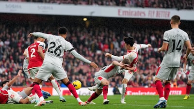 Arsenal's Takehiro Tomiyasu scores his sides fifth goal. PA
