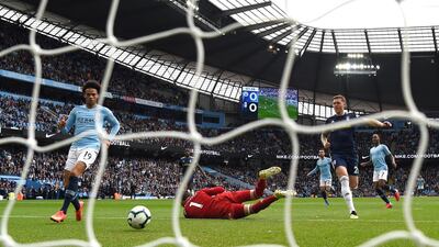 Leroy Sane scores his team's first goal past Marcus Bettinelli of Fulham - their 34th unbeaten match in a row against promoted teams at the Etihad Stadium. Getty Images