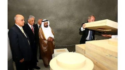 Above, Dr Sheikh Sultan bin Mohammed, the Ruler of Sharjah, launches the emirate's earthquake monitoring centre last month. Satish Kumar / The National Below, the earthquake that shattered Bam, Iran in 2003 was only 500km from the Emirates. Anna Kenare / AFP