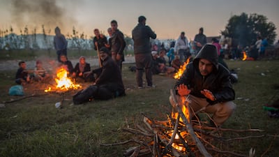 Migrants who have just crossed the Greek border light fires outside a refugee reception centre set up close to the railway station in Gevgelija, Macedonia. Despite the worsening weather, thousands of migrants have continued to arrive daily in Former Republic of Macedonia and the small border town of Gevgelija, as they continue their journey on towards western Europe. Matt Cardy / Getty Images