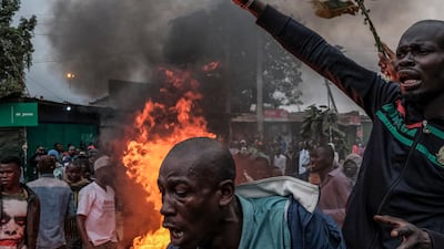 Supporters of Raila Odinga protest in Kibera against the result of the close vote. Deputy President William Ruto was declared the winner, despite several commissioners rejecting the results. AFP