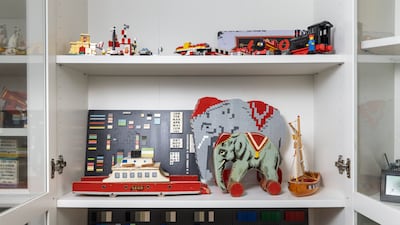 Lego also made a wooden elephant toy, which Jamal has recreated with bricks